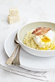 Parmesan risotto with poached egg and bacon