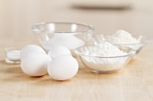 Ingredients for biscuit dough: flour, eggs and sugar