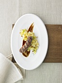 Deichlamm sausage with malt beer and pointed cabbage