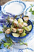 Chicken kebabs with peppers and limes