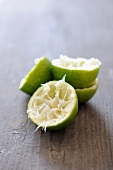 Several squeezed lime halves