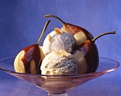 Poached pears with chocolate sauce and vanilla ice cream