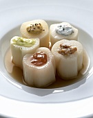 Stuffed white turnips with assorted sauces