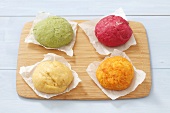 Four types of noodle dough, neutral and colored (with carrots, red beets and spinach)