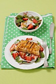 Red beet salad with strawberries and grilled salmon
