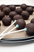 Cake pops being stuck on dipped sticks