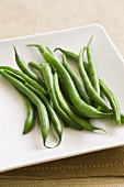 Green beans on a square plate