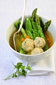 Mange tout and asparagus soup with cheese dumplings