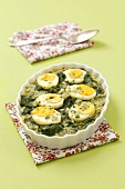 Spinach bake with egg and parmesan
