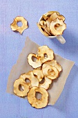 Organic apple chips on baking paper