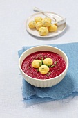 Beetroot soup with cheese dumplings