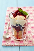 Layered dessert with amaretti, cherries and ice cream