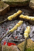 Stick bread over a campfire