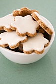 A bowl of almond and cinnamon biscuits
