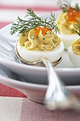 Stuffed eggs with caviar and dill