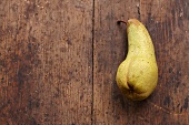 A pear on a wooden background