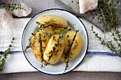 Fried new potatoes with thyme