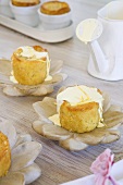 Baked pear and almond puddings with lemon cream