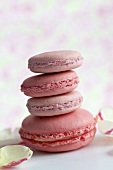 A stack of rose and strawberry flavoured macaroons