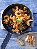 Prawns in melasse sauce with peppers and tomatoes