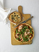 Focaccia with olives and pizza with crabs