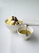 Vanilla ice cream with two sauces