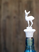 Bottle with a deer-shaped stopper