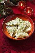 Fish filled dough parcels for Christmas (Poland)