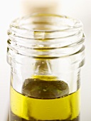 A bottle of olive oil (close-up)