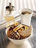 Marzipan biscuits, truffle biscuits and almond biscuits with coffee