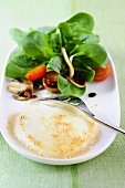 Lambs lettuce with grilled sesame goat's cheese