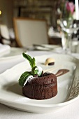 Chocolate cake with a liquid core in the hotel restaurant Chateau Mcely (Czech Republic)