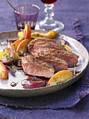 Duck breast with an apple and onion medley