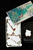 Shortbread biscuits with white icing and a Christmas card