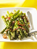 Grilled asparagus with bacon strips