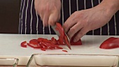 Chopping a red pepper