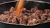 Sautéing mince in a frying pan