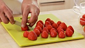 Fresh strawberries being chopped