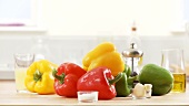 Colourful peppers, salt, garlic, olive oil