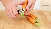 Carrots being peeled