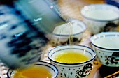 Grünen Tee eingiessen (China)