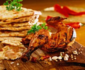 Chicken drumsticks and flatbread