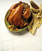 Roast Turkey with Wild Rice Stuffing and Gravy in Pitcher