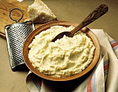 Bowl of Mashed Potatoes with Grated Parmesan