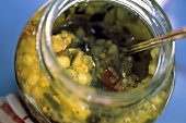 Jar of Pickle Relish with a Spoon