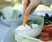 Dipping a Carrot Stick into Dip