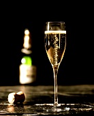 A Glass of Champagne with Champagne Cork