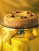 Whole Cheesecake with Lemon Glaze; Raspberries