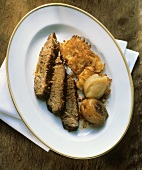 A Serving of Beef Brisket and Latkas