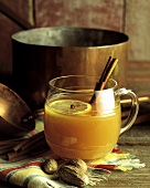 Hot Apple Cider with Cinnamon Sticks in a Glass Mug